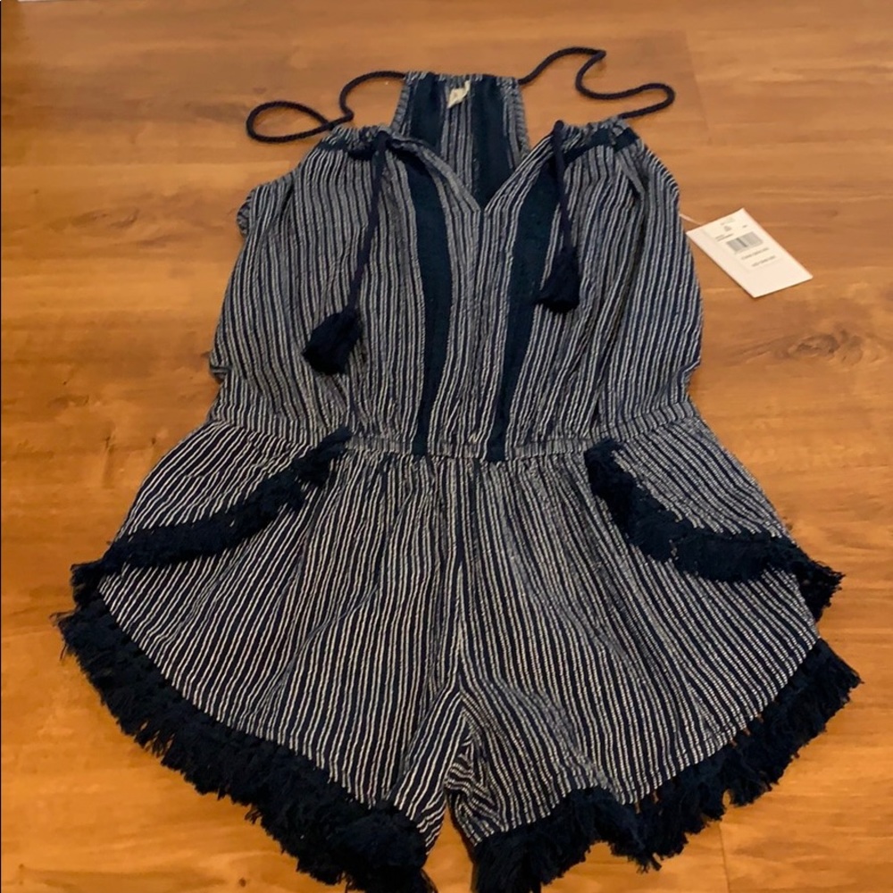 navy blue and white romper with tags. !